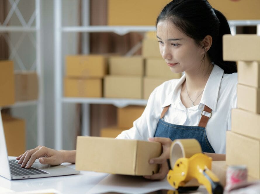 Beautiful young woman with online sales and delivery business.
